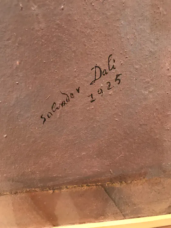 Salvador Dali's signature on "Figure at a Window"